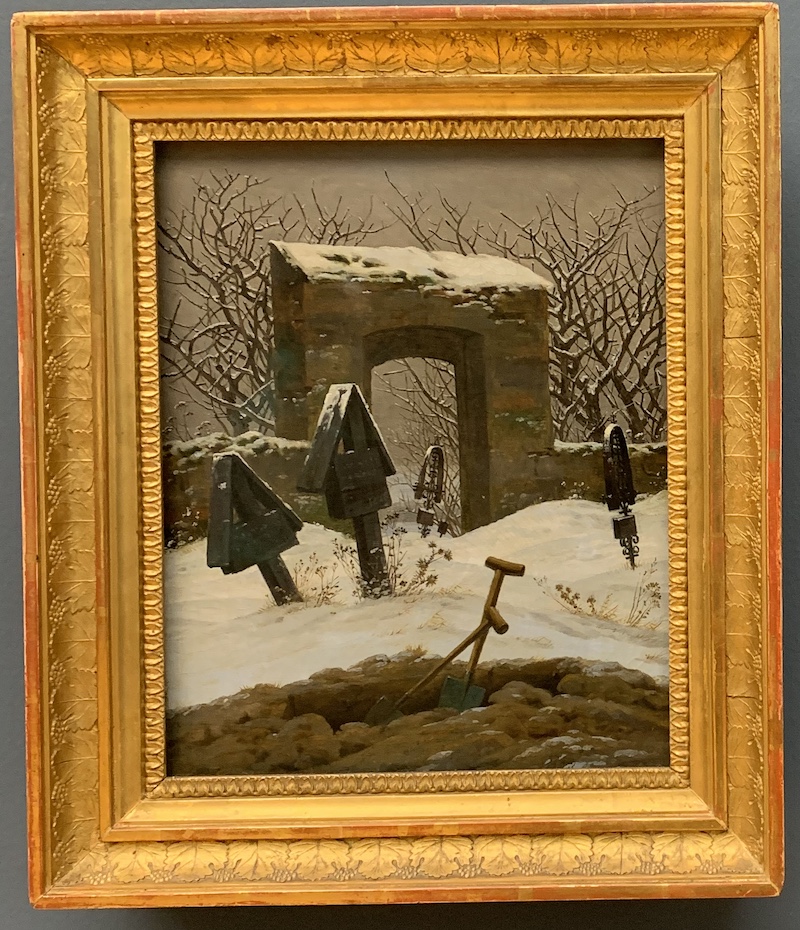 A snow covered, abandoned graveyard, two wooden crosses and two iron crosses on unkept graves, a brick gate in the back.